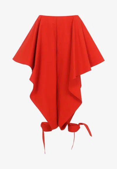 Alaïa Ruffled Paneled Pants With Cut-outs In Orange