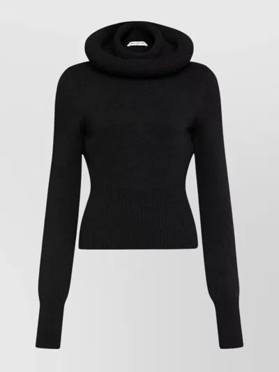 ALAÏA SCULPTURAL HOODED RIBBED KNIT SWEATER