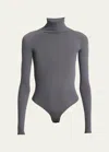 Alaïa Semi-sheer Turtleneck Bodysuit In Asphalte