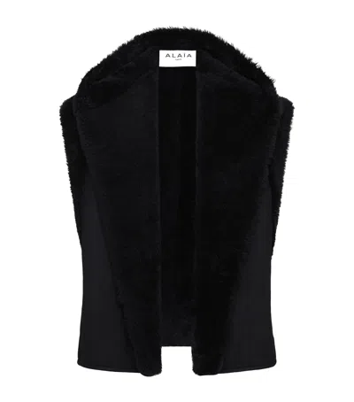 Alaïa Shearling Hooded Gilet In Black