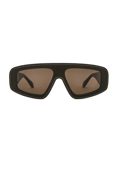 Alaïa Shield Sunglasses In Black