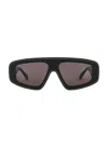 Alaïa Shield Sunglasses In Black