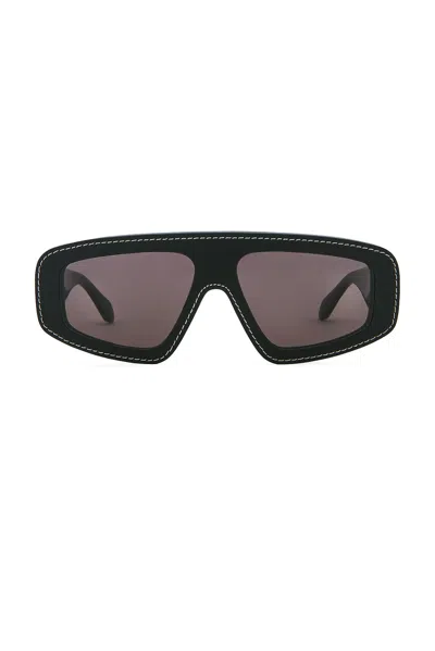 Alaïa Shield Sunglasses In Black
