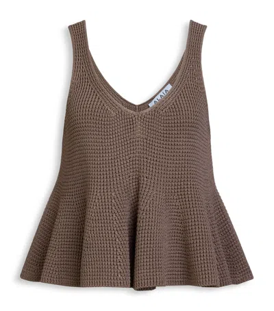 Alaïa Silk Knit Peplum Top In Brown