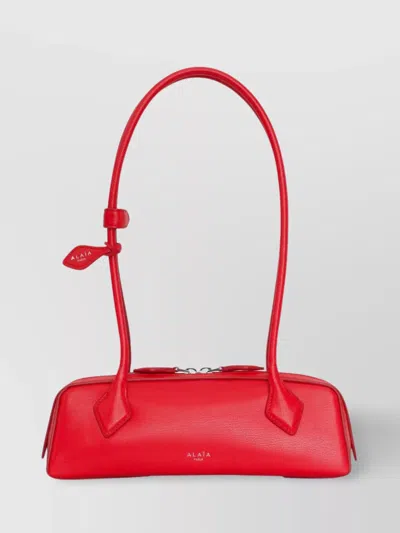 ALAÏA SMALL LEATHER BAG TOP HANDLE