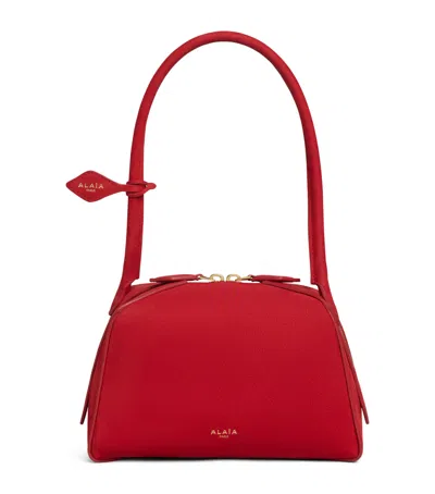 Alaïa Small Leather Le Bouledogue Shoulder Bag In Red