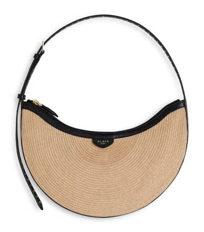 Alaïa Small One Piece Demi Lune Shoulder Bag In Neutral
