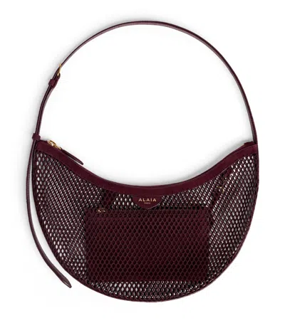 Alaïa Small One Piece Demi Lune Shoulder Bag In Burgundy