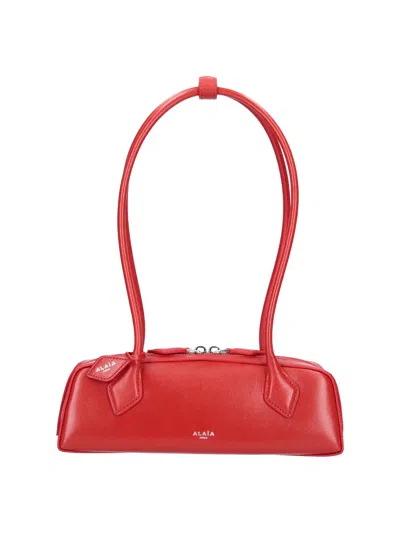 Alaïa Small Shoulder Bag "le Teckel" In Red