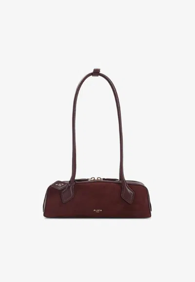 Alaïa Small Teckel Suede Shoulder Bag In Red