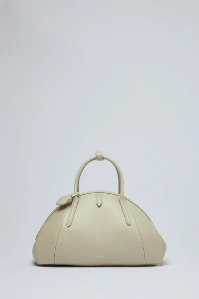 Alaïa Small Top Handle Purse In Beige