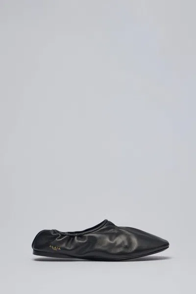 Alaïa Soft Leather Slippers In Black