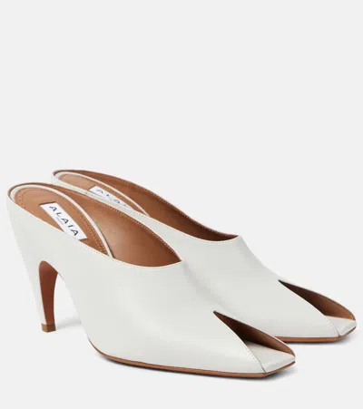 Alaïa Spike Leather Mules In White