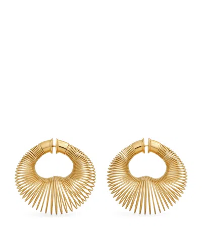 Alaïa Spiral Hoop Earrings In Gold
