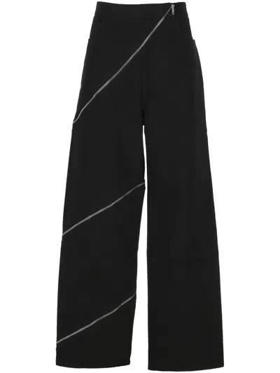 ALAÏA ALAIA SPIRAL ZIP BLACK JEANS