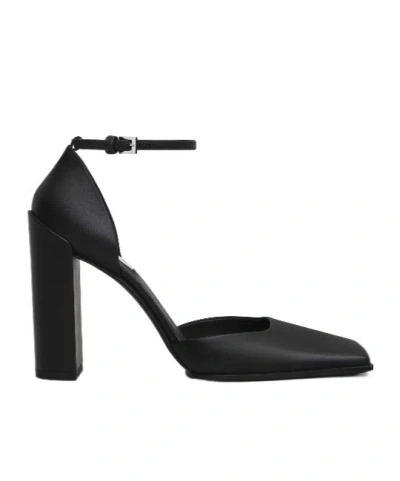 Alaïa 90 Leather Pumps In Black