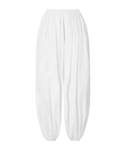 Alaïa Striped Cotton-poplin Tapered Pants In White