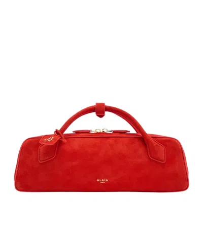 Alaïa Suede Clutch In Red