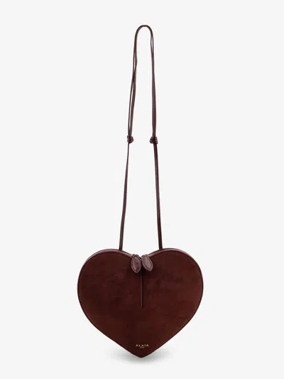 Alaïa Suede Le Coeur Crossbody Bag In Brown