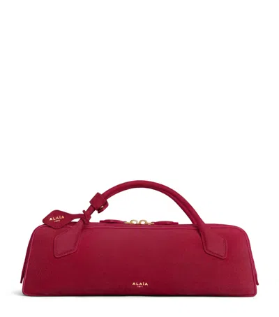Alaïa Suede Le Teckel Clutch Bag In Red