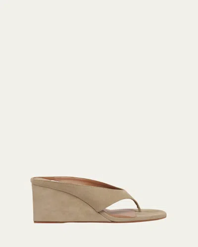 ALAÏA SUEDE WEDGE THONG SANDALS