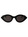 Shop Alaïa Sunglasses In 001 Black Black Grey