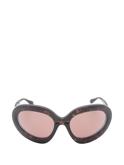 Alaïa Sunglasses In Black