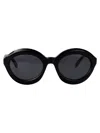 Alaïa Alaia Round Sunglasses Aa0088 S 001 In Black-black-grey