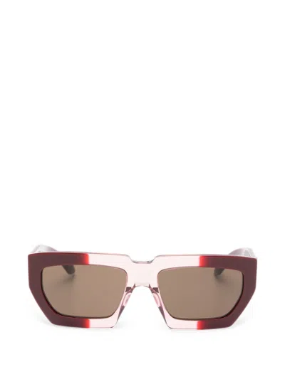 Alaïa Framed Sunglasses In Brown