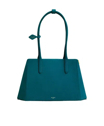Alaïa Teal Suede Handbag In Blue