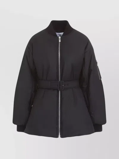 ALAÏA TECHNICAL BELTED BOMBER JACKET