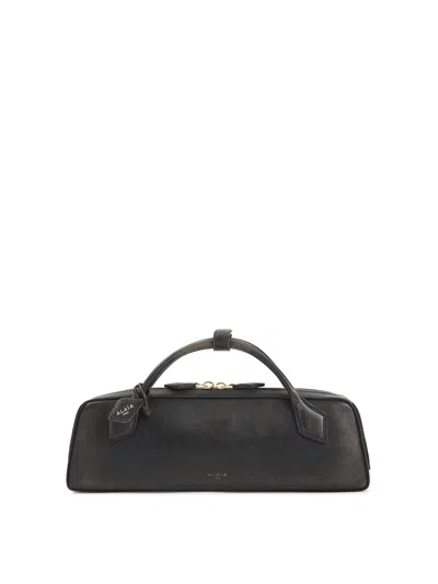 Alaïa Teckel Clutch In Brown