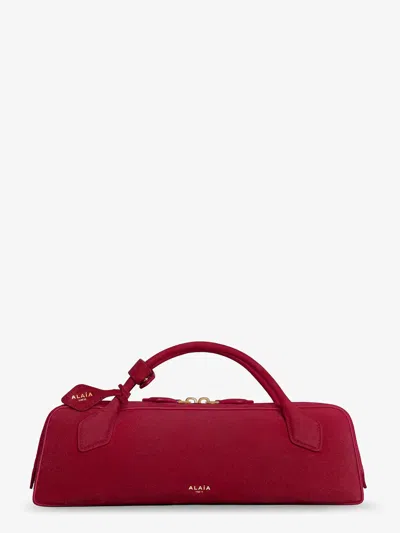Alaïa Teckel Clutch Suede Handbag In Red