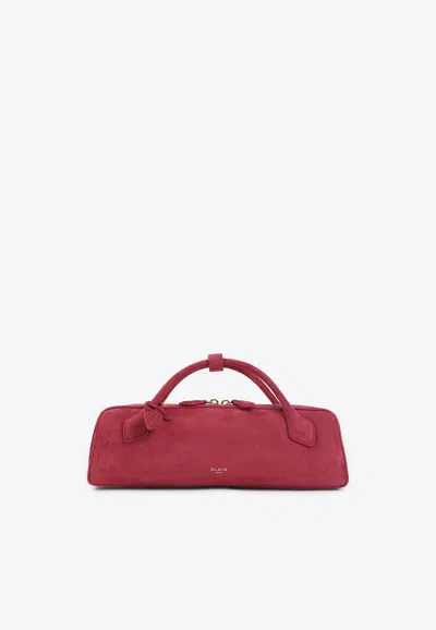 Alaïa Teckel Suede Top Handle Bag In Pink