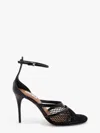 ALAÏA THONG SANDALS IN FISHNET AND PATENT LEATHER