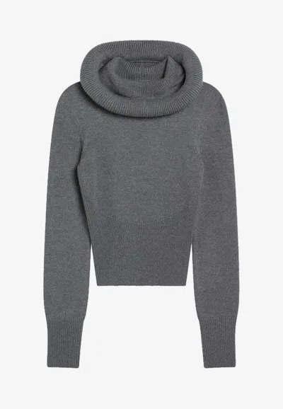 ALAÏA TURTLENECK KNITTED WOOL SWEATER