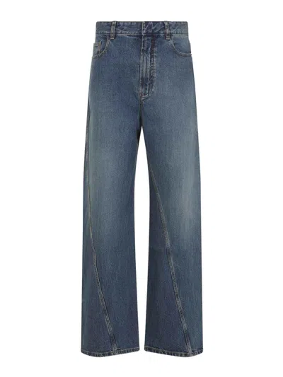 ALAÏA TWISTED JEANS