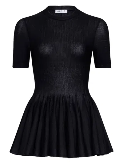 Alaïa Ultra Fine Wool Merino Peplum Top Clothing In Black