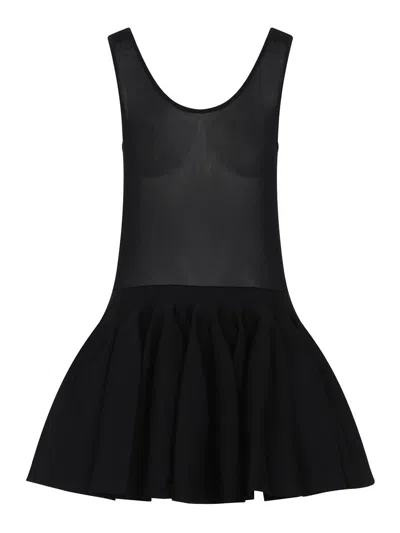 Alaïa Knitted Minidress In Noir Alaia