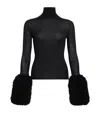 Alaïa Draped Long-sleeve Knit Bodysuit In Black