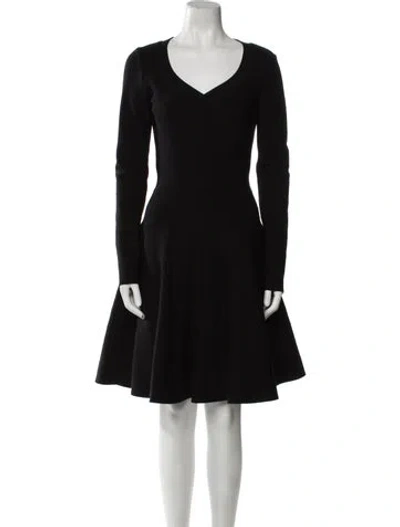 Pre-owned Alaïa Virgin Wool Knee-length Dress In Black