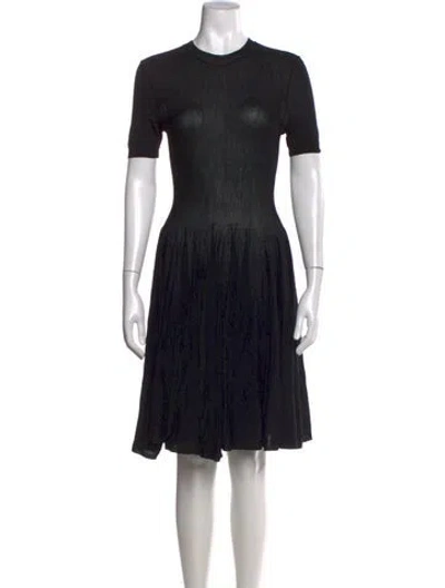 Pre-owned Alaïa Virgin Wool Knee-length Dress In Black