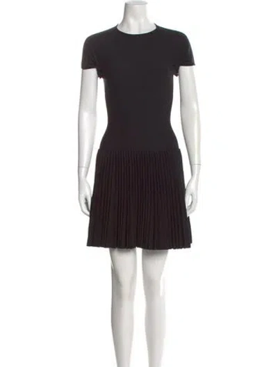 Pre-owned Alaïa Virgin Wool Mini Dress In Black