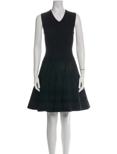 Pre-owned Alaïa Virgin Wool Mini Dress In Black