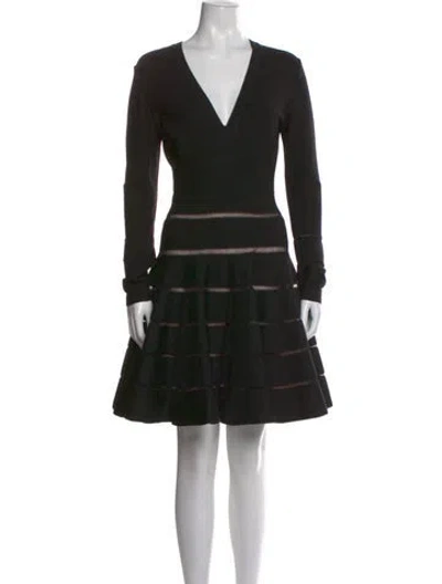 Pre-owned Alaïa Virgin Wool Mini Dress In Black