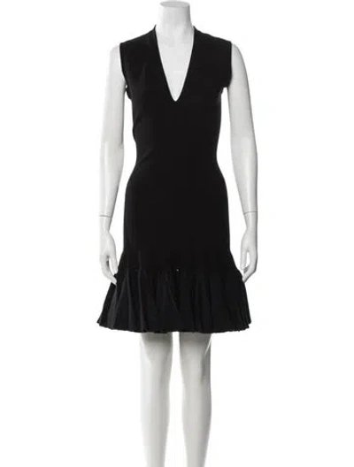 Pre-owned Alaïa Virgin Wool Mini Dress In Black