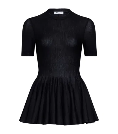 ALAÏA VIRGIN WOOL PEPLUM TOP