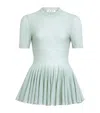 Alaïa Virgin Wool Peplum Top In Blue