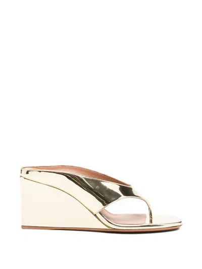 Alaïa Wedge Thong Mules In Neutral