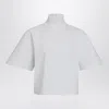 Alaïa High Neck Button Detail Cropped Top In White